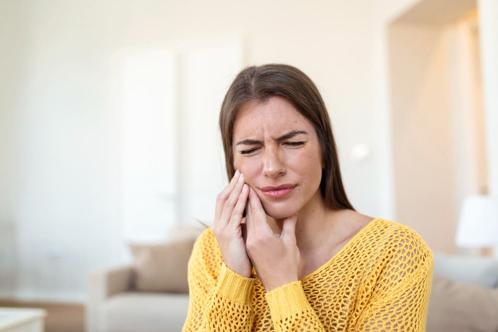tooth-pain-dentistry-beautiful-young-woman-suffering-from-terrible-strong-teeth-pain-touching-cheek-with-hand-female-feeling-painful-toothache-dental-care-health-concept-high-resolution-1.jpg